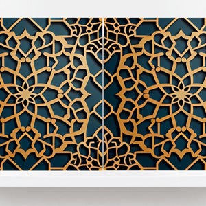 May include: A decorative wall panel with a geometric pattern. The panel is made of gold metal and has a dark blue background.