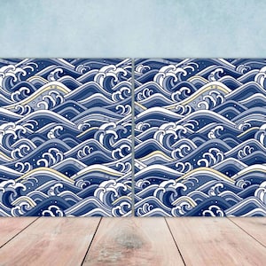 May include: Two panels of blue and white waves in a repeating pattern. The waves are stylised and resemble Japanese art.