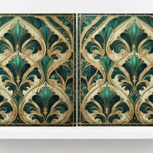 May include: Two decorative panels with a repeating ornate design. The pattern features teal and gold stylized leaves and swirls against a cream background. The panels are displayed on a white shelf, creating a sophisticated and elegant aesthetic.