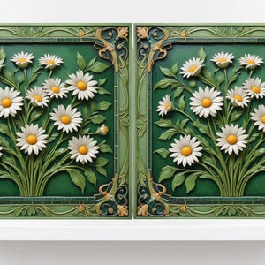 May include: Two square ceramic tiles with a green background and a raised design of white daisies with yellow centres. The tiles are framed with a gold-coloured border.
