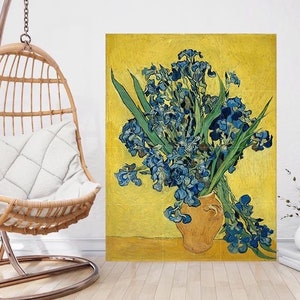 May include: A painting of a bouquet of blue irises in a yellow vase against a yellow background. The flowers are arranged in a loose, natural style, and the vase is simple and elegant.