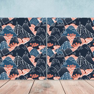 May include: A seamless pattern featuring a repeating design of blue and white mountains with red flowers. The mountains are stylised and have a traditional Japanese aesthetic.