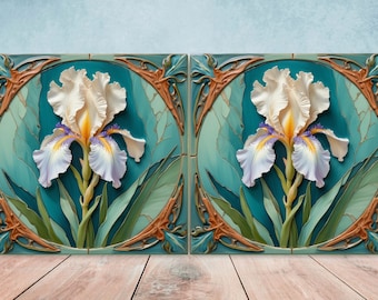 May include: Two ceramic wall tiles with a raised design of white irises with purple and yellow accents on a teal background. The tiles are framed with a gold and brown Art Nouveau design.