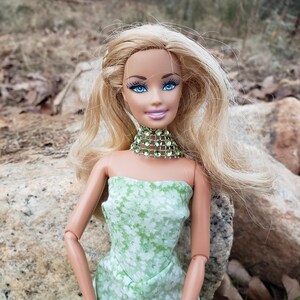 Long beautiful dress for doll