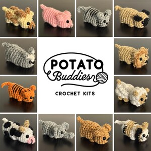 May include: A collection of crocheted animal figures in various colors and patterns, including a pig, cat, tiger, and cow. The figures are part of a crochet kit, as indicated by the text "POTATO Buddies CROCHET KITS" in the center of the image.