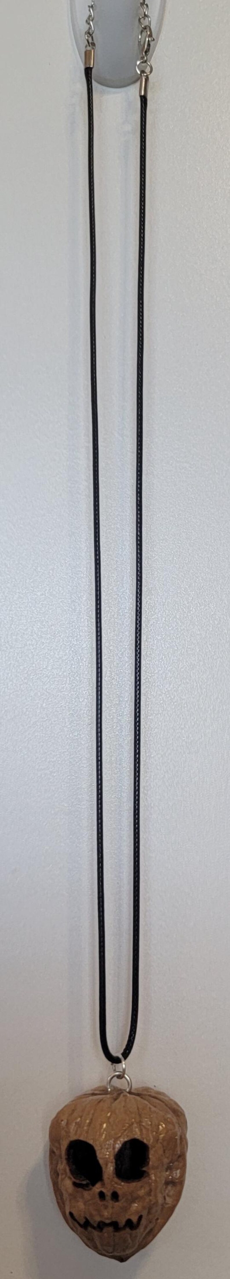Large Evil Walnut or Pumpkin Face Pendant Necklace Round Hollow Eyes