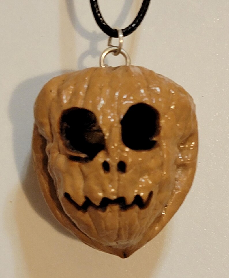 Large Evil Walnut or Pumpkin Face Pendant Necklace Round Hollow Eyes