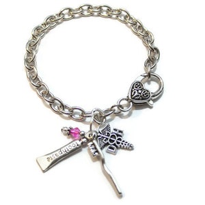 Dental Hygienist DH Caduceus and Toothpaste Toothbrush Charm Bracelet With Coordinating Glass Bead