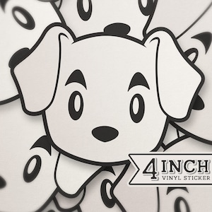 以下が含まれることがあります： 大きく黒目がちな目と小さな鼻を持つ白黒の漫画の犬のステッカー。ステッカーは4インチで、「4 inch vinyl sticker」と書いてあります。