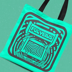 May include: A turquoise tote bag featuring a black and white graphic of an arcade game called "Polybius".