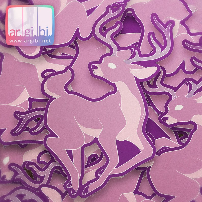 May include: A stack of purple deer stickers with a glittery finish. The deer are running and have antlers. The stickers are from the website ar.gi.bi.net.