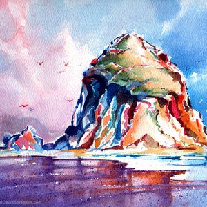 May include: Watercolor painting of a rocky island with a blue sky and pink clouds. The island is surrounded by water and there are birds flying in the sky.