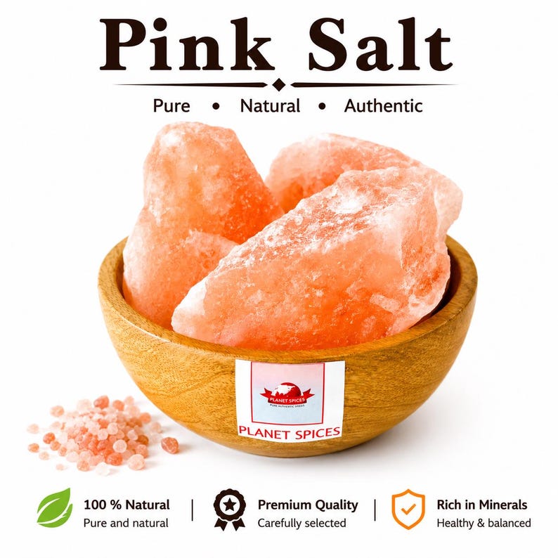 May include: Large chunks of pink Himalayan salt are piled inside a small wooden bowl. The bowl features a Planet Spices label. Text above reads Pink Salt, Pure, Natural, Authentic. Below are icons with text 100% Natural, Premium Quality, Rich in Minerals.