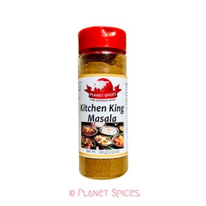 May include: A glass jar with a red lid filled with brown Kitchen King Masala spice blend. The label reads "Planet Spices Pure Authentic Spices Kitchen King Masala Net Wt.: 100 g (3.53 oz)"