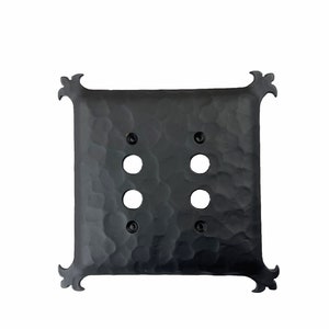 May include: Black metal 4-gang switch plate with a hammered finish and decorative fleur-de-lis accents.
