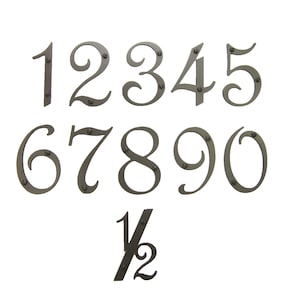 May include: A set of ten metal house numbers in a decorative script font, with the numbers 1 through 10 and a half. The numbers are painted a dark gray color and have small metal rivets.