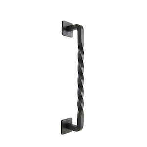 May include: Black metal door pull with a twisted design. The pull has a square base and a long, twisted handle.