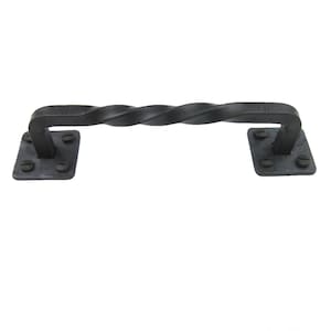 May include: Black metal door pull with a twisted design and square plates on each end.