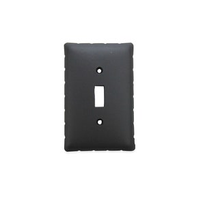 May include: A black single-gang light switch plate with a decorative, textured border.