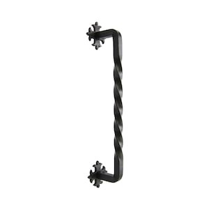 May include: Black wrought iron door pull with a twisted center and decorative fleur-de-lis ends. The handle is a sturdy, vertical design, suitable for doors or gates. The overall style is rustic and elegant.