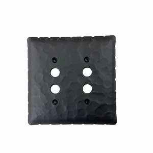 May include: Black hammered metal double switch plate cover with four holes for switches or outlets.
