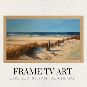 May include: A painting of a beach scene with a wooden fence in the foreground. The beach is sandy and there are waves in the ocean in the background. The sky is blue and there are clouds in the sky. The painting is framed in a brown frame. The text "FRAME TV ART CAPE COD - INSTANT DOWNLOAD" is below the painting.