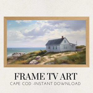 May include: A framed painting of a white house on a grassy hill overlooking the ocean. The sky is cloudy and the water is blue. The painting is titled "FRAME TV ART CAPE COD - INSTANT DOWNLOAD".