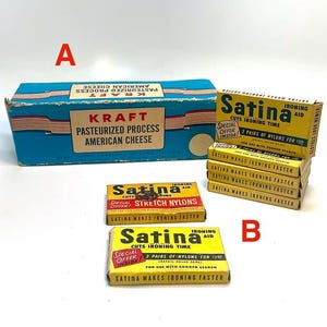 May include: A blue Kraft Pasteurized Process American Cheese box labeled A, and several yellow Satina Ironing Aid boxes labeled B. The Satina boxes feature black and red text, including 'Cuts Ironing Time', 'Special Offer Inside', and '2 Pairs of Nylons'.