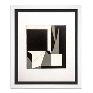 May include: Abstract geometric art print in a white frame with a black border. The artwork features a composition of black, white, and gray shapes, including squares, triangles, and rectangles. The overall design is minimalist and modern.