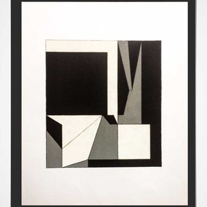 May include: Abstract geometric art print in a black frame. The artwork features a composition of black, white, and gray shapes, including squares, triangles, and rectangular forms. The design is minimalist and modern, with a focus on geometric shapes and contrasting colors.