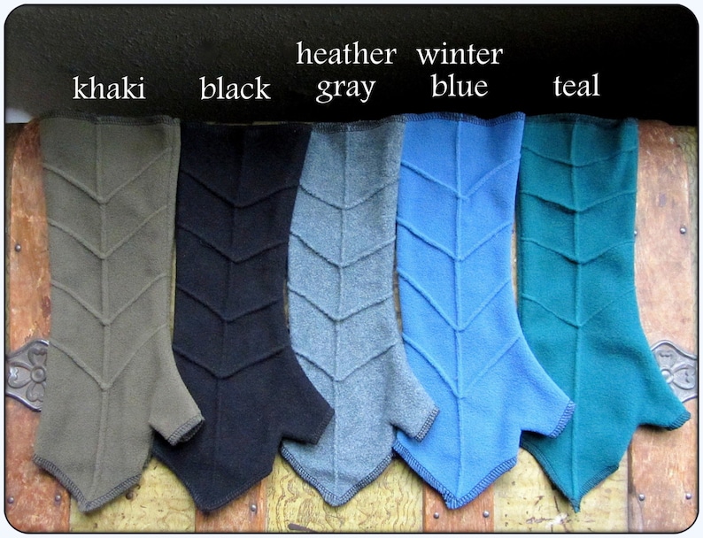 May include: Five pairs of fingerless gloves in different colours: khaki, black, heather grey, winter blue, and teal. Each glove has a chevron pattern.