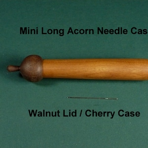 Wood Mini Long Acorn Needle Case, WALNUT Lid and CHERRY Case. It measures 4” long and 3/4” in diameter. For Cross Stitch, Quilting.