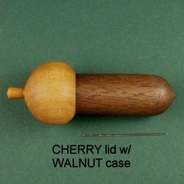 Wood Acorn Needle Case, Cherry Lid and Walnut Case. It measures 2 3/8” long and 7/8” in diameter +/- 1/8”.For Cross Stitch, Quilting,Beading