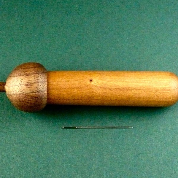 Wood Acorn Needle Case, Walnut Lid and Cherry Case. It measures 4” long and 7/8” in diameter +/- 1/8”.For Cross Stitch, Quilting,Beading