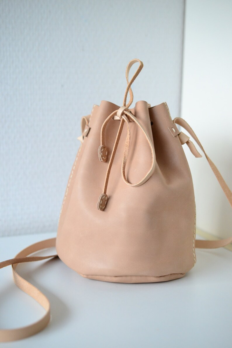 Leather draw string bag, hand stitched round sling bag, Body cross bag. image 5