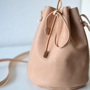 Leather draw string bag, hand stitched round sling bag, Body cross bag. image 3