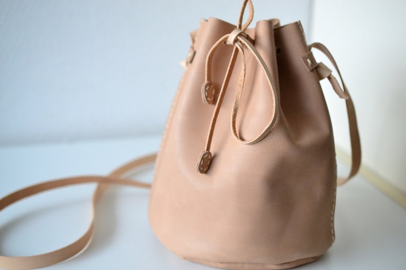 Leather draw string bag, hand stitched round sling bag, Body cross bag. image 3