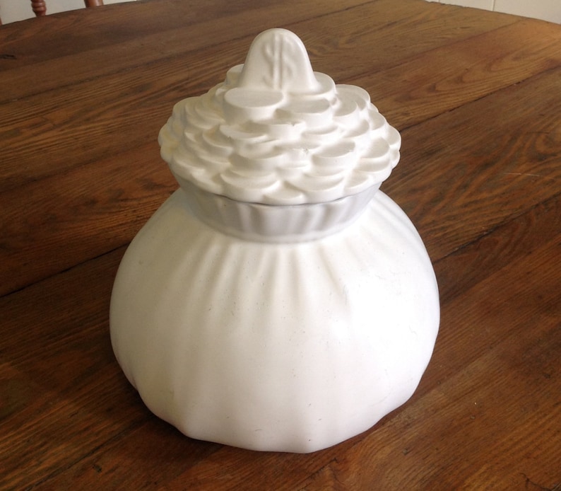 Money bag sack cookie jar collectible pottery by Terrace Ceramics from Shawnee mold white matte kitschy country cottage style kitchen decor