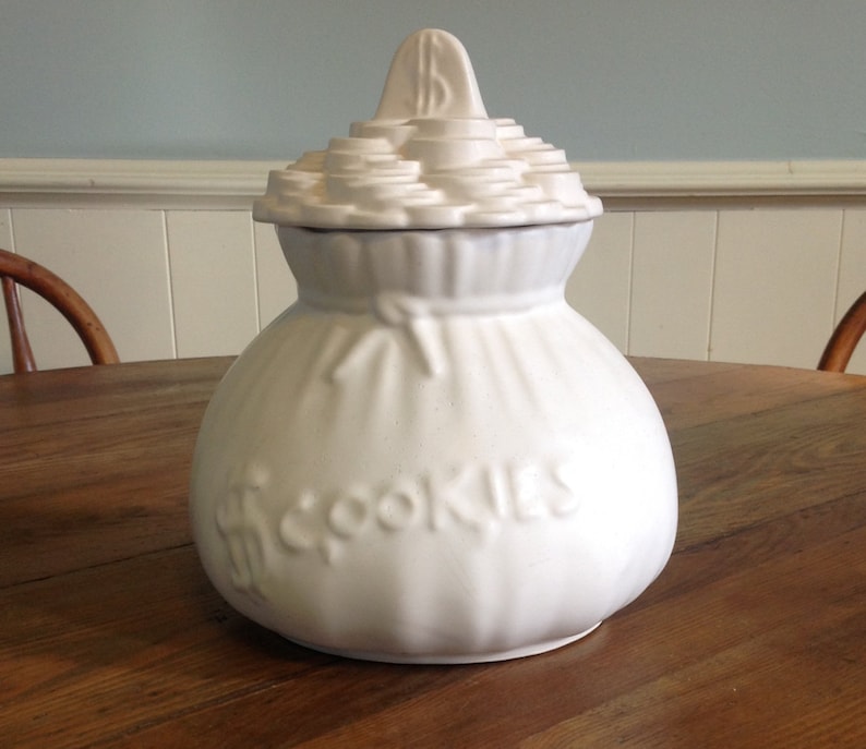 Money bag sack cookie jar collectible pottery by Terrace Ceramics from Shawnee mold white matte kitschy country cottage style kitchen decor