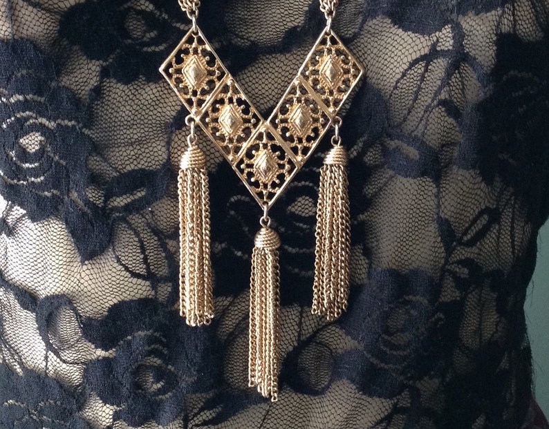 Sarah Coventry designer tassel necklace multi-chain ornate gold tone pendant bohemian boho chic gypsy costume jewelry