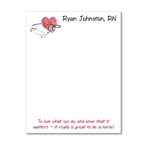 May include: A white notepad featuring a red scribbled heart with a stethoscope, the text Ryan Johnston, RN, and the phrase To love what you do, and know that it matters – it really is great to be a nurse! printed in red at the bottom.
