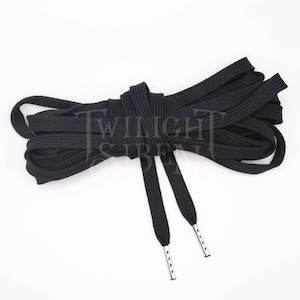 Black cotton flat lacing for corsets, stays gowns or shoes with the ends finished with metal aglets.