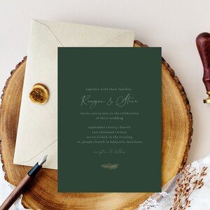 May include: A green wedding invitation with white text announcing the wedding of Reagan and Steve on 24th September 2020 at 7:00 PM at St. Joseph Church in Lafayette, Louisiana. The invitation includes the text "Reception to follow".