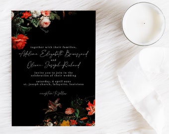 May include: A black wedding invitation with floral accents and elegant script. The invitation includes the names Adeline Elizabeth Broggard and Oliver Joseph Richard, along with the wedding date and location. A candle and greenery are also in the image.