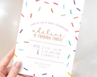 May include: A white birthday invitation with a colorful sprinkle pattern. The invitation reads "Join us for a sweet celebration! Adeline is turning three!"  April 6, 2:00-4:00 PM, CCC Julie Lane, Lafayette, LA. Text ECC CCC.111 to RSVP.