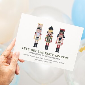 May include: A white invitation card with three illustrated nutcracker figures. The text on the card reads "LET'S GET THIS PARTY CRACKIN' please join us for a Christmas party saturday, december 22 at 7 pm | 1555 Julie Lane, Lafayette, LA 70508 please reply to 555.555.5555"