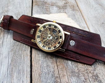 Montre en cuir pour homme, montre-bracelet à cadran doré squelette, montre-manchette mécanique steampunk, montre-bracelet à remontage manuel marron foncé