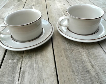 FENNICA Arabia Finland Fennica Tasse und Untertasse Set: Richard Lind Design