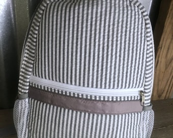 gray pink backpack