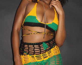 Jamaican cross strap bikini top with high waisted rectangular mesh skirt.